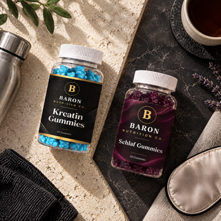 Top-down view of both Baron jars, one on stone with a water bottle, one on marble with lavender and a sleep mask