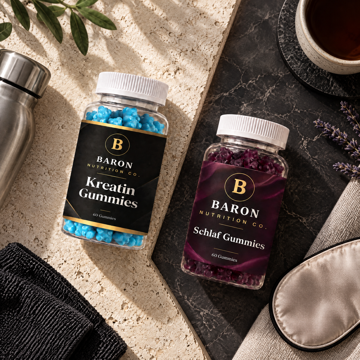 Top-down view of both Baron jars, one on stone with a water bottle, one on marble with lavender and a sleep mask
