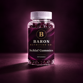 Baron Sleep Gummies jar with deep berry label and dark purple gummies on a bedside table